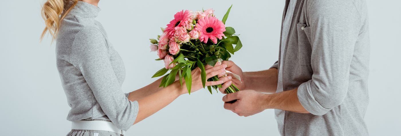 Giving flowers to loved one